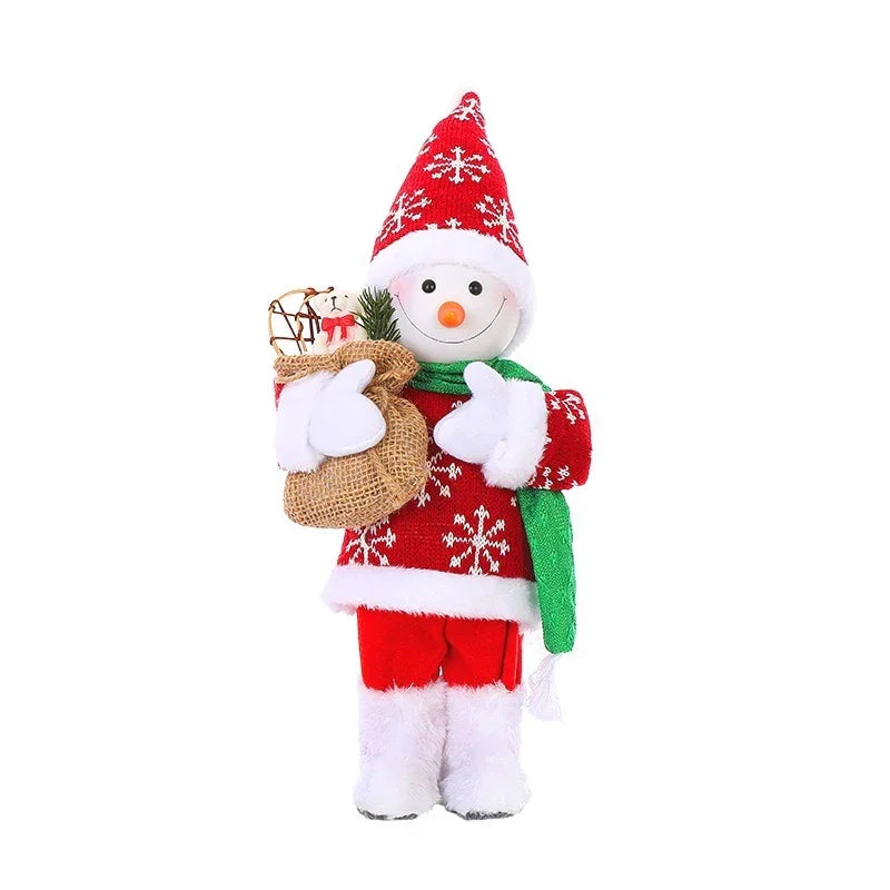 Bonhomme de neige en pull rouge à flocons blancs, bonnet assorti, écharpe verte, tenant un sac en toile avec cadeaux de Noël