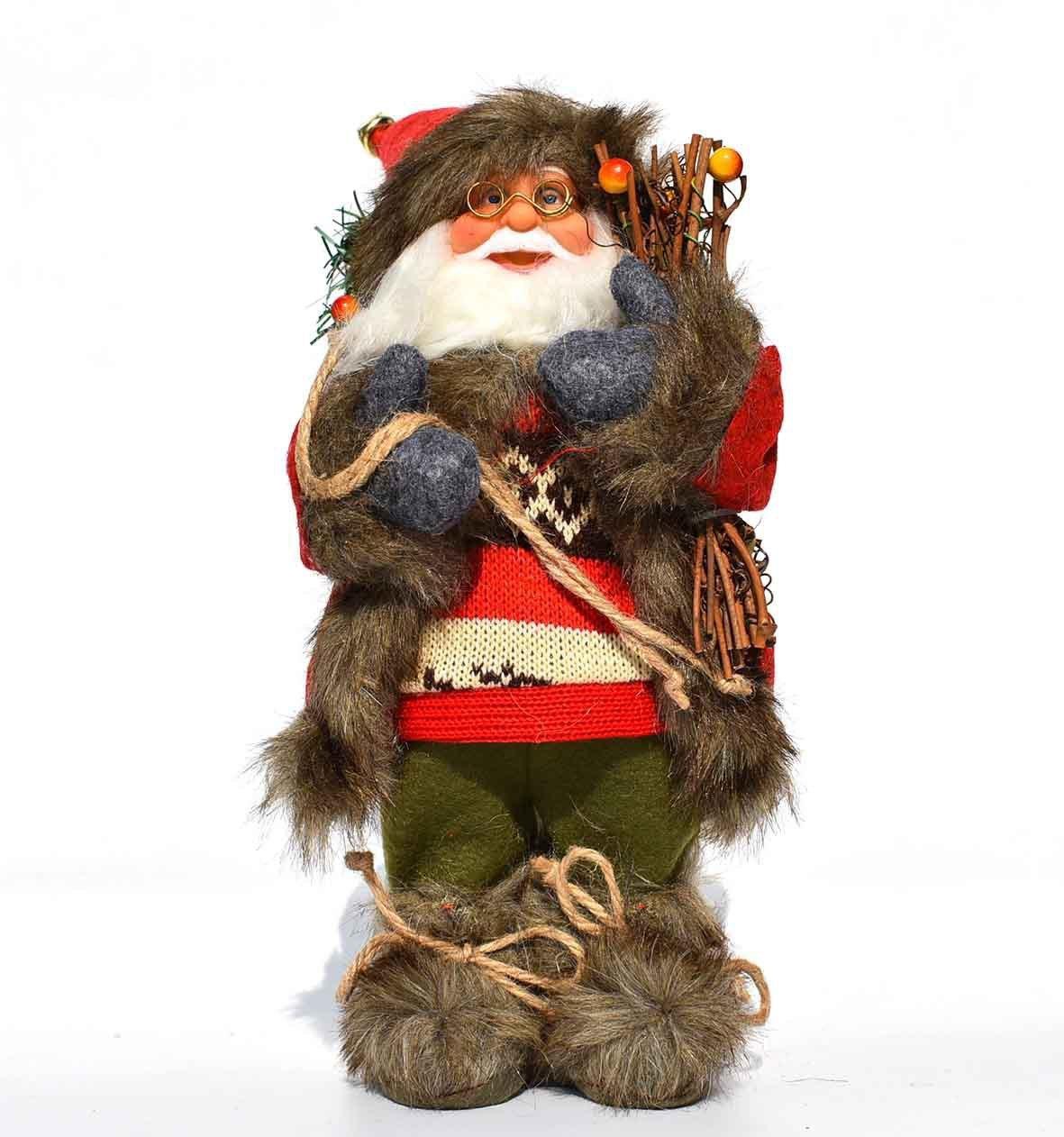 Figurine de Père Noël en peluche avec pull rouge, lunettes, bottes en fausse fourrure et bouquet de branches